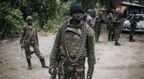 Extremists with ties to the Islamic State group kill at least 26 people in eastern Congo